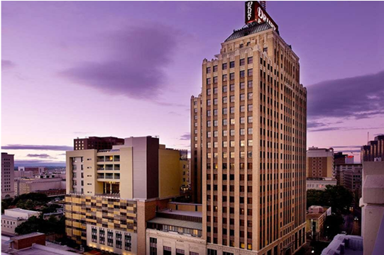 Hotel towering above San Antonio on Riverwalk
