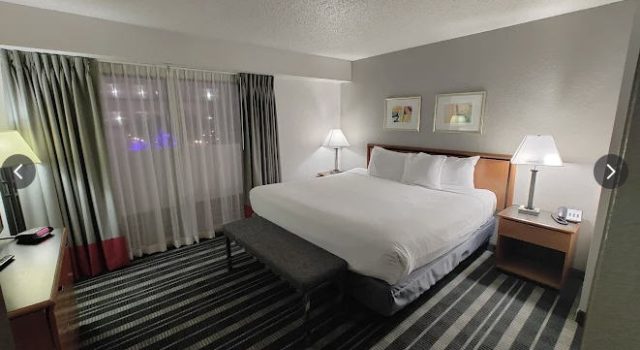 Atrium Hotel King size bed room